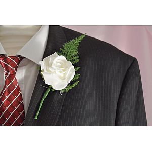 White single artificial rose buttonhole with fern