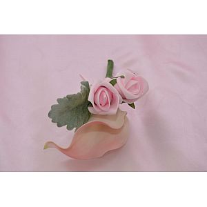 Pink and white calla lily and pink artificial rose triple buttonhole with dusty greenery to the back