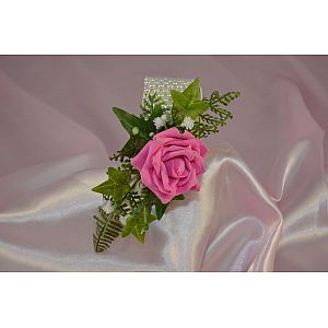 Pink rose wrist corsage, with gypsophila, Ivy & Fern