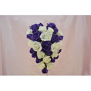 Brides artificial purple and ivory rose heart teardrop wedding bouquet.